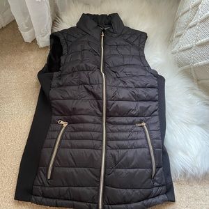 Black vest with golden details